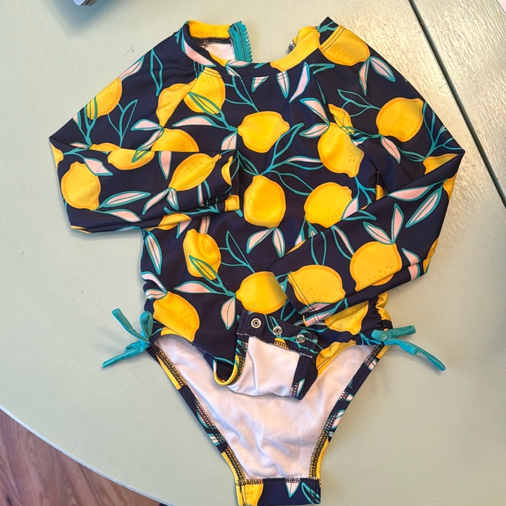 One piece with snap crotch lemons swim suit-long sleeve!
